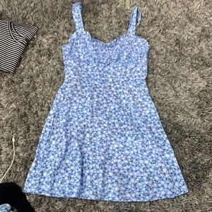Woman’s floral blue dress